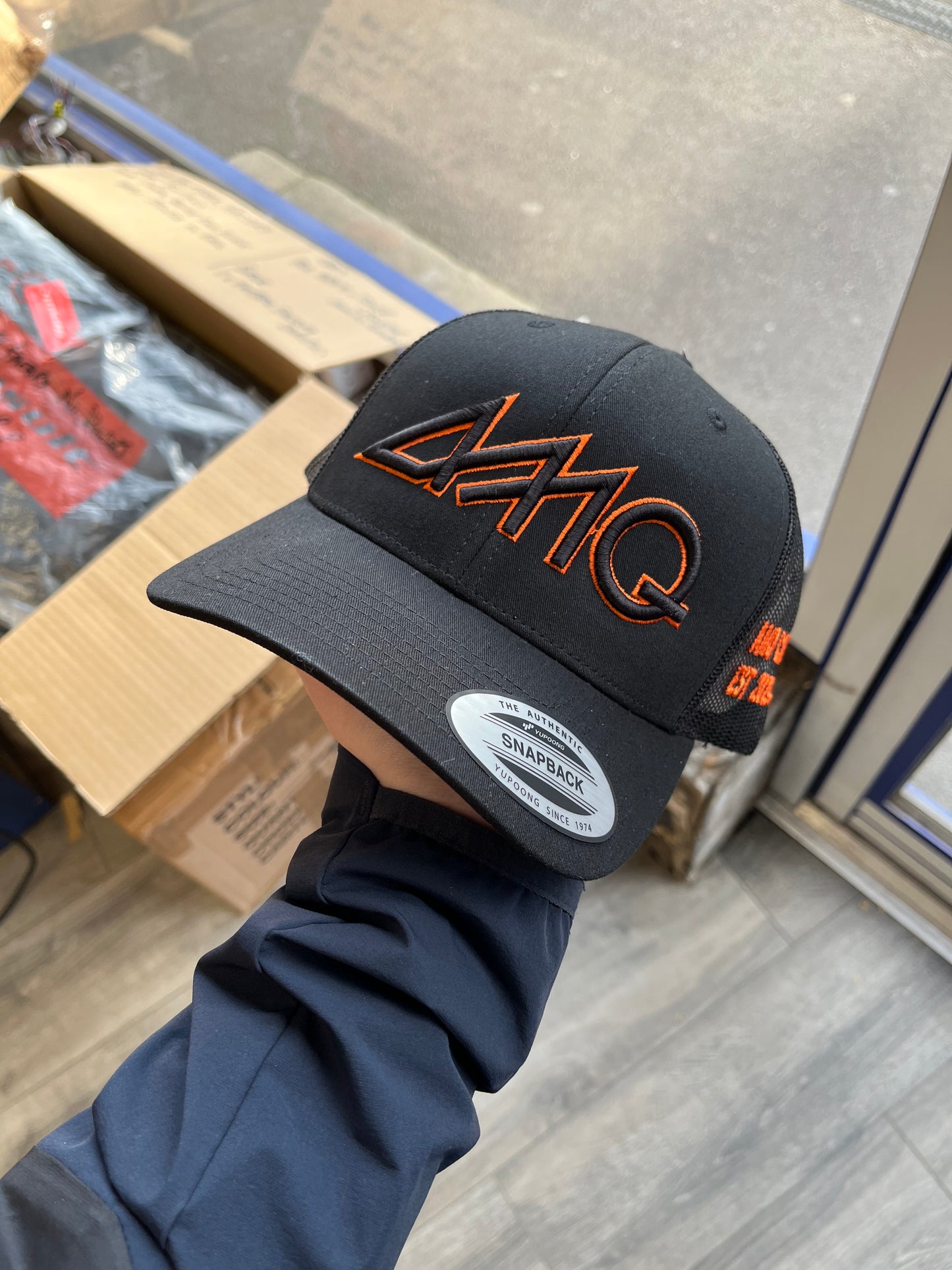 Black on black & neon orange cap