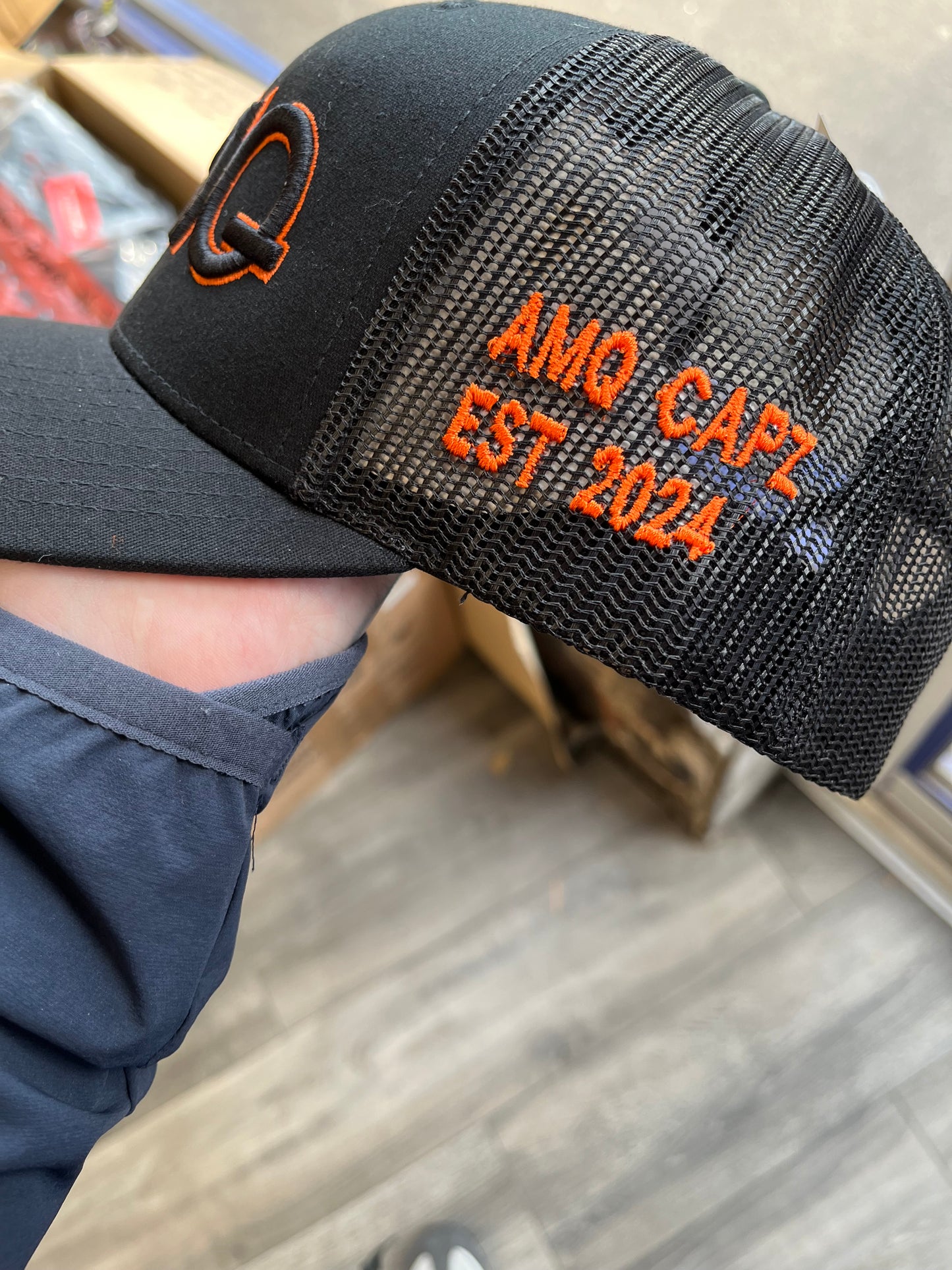 Black on black & neon orange cap